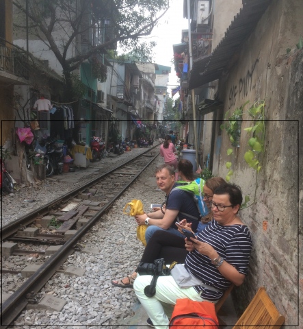 excited to drink beer and egg coffe beside railway 